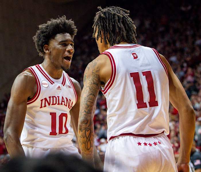 Indiana's Kaleb Banks (10) celebrates with CJ Gunn (11) after Gunn's basket and foul during the first half of the Indiana versus Ohio State men's basketball game at Simon Skjodt Assembly Hall on Saturday, Jan. 6, 2024.